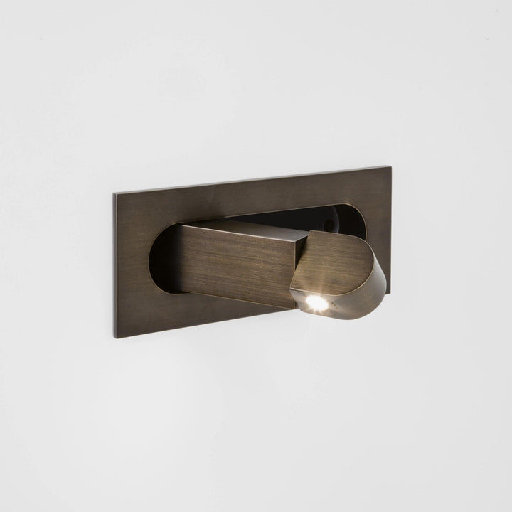 Contemporary LED wall lamp, adjustable for reading, with a sophisticated design for any room.