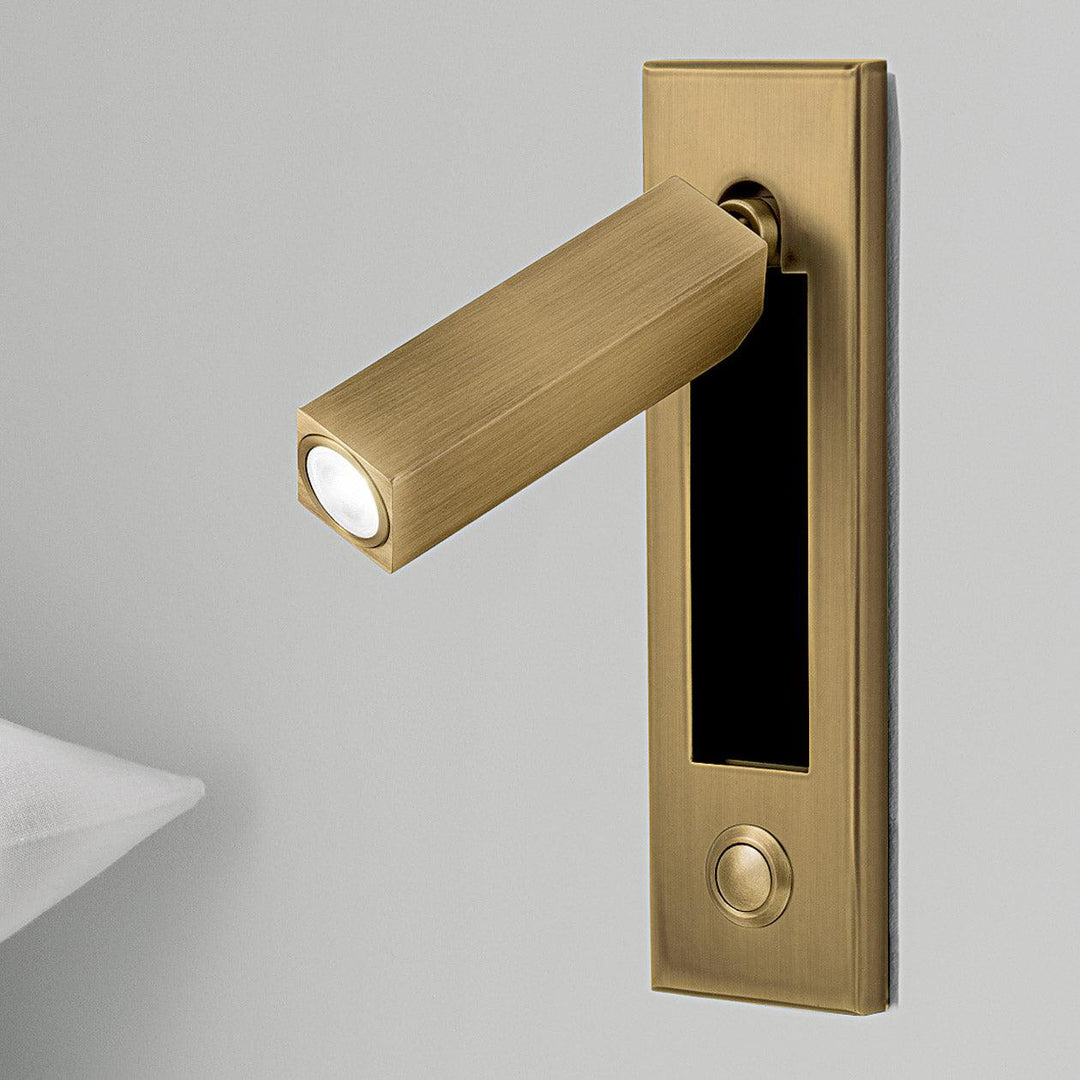 Wall-mounted LED bedside light, modern design, adjustable head for focused reading.