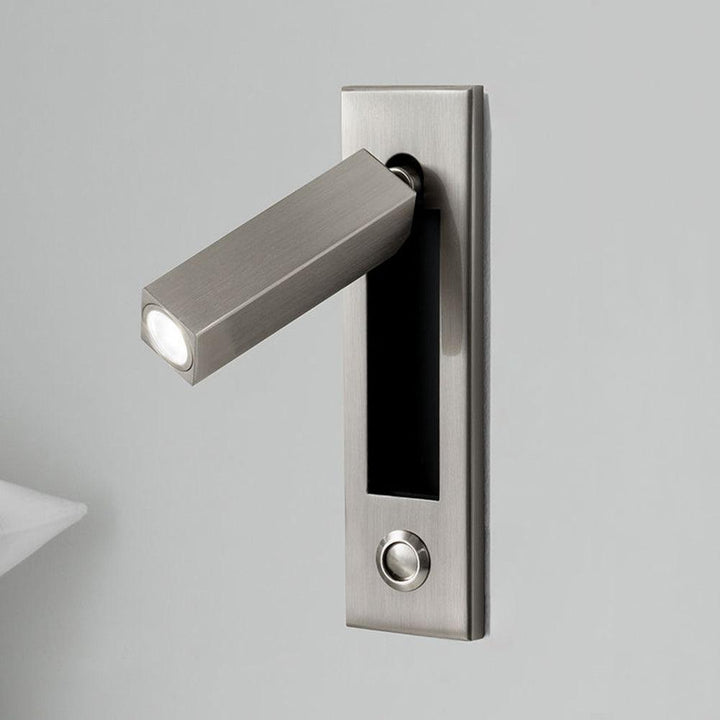 Space-saving adjustable LED wall light, ideal bedside reading lamp for small bedrooms.