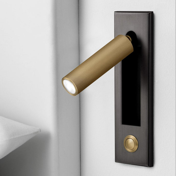Contemporary LED wall light, adjustable for reading, enhancing modern bedroom ambiance.