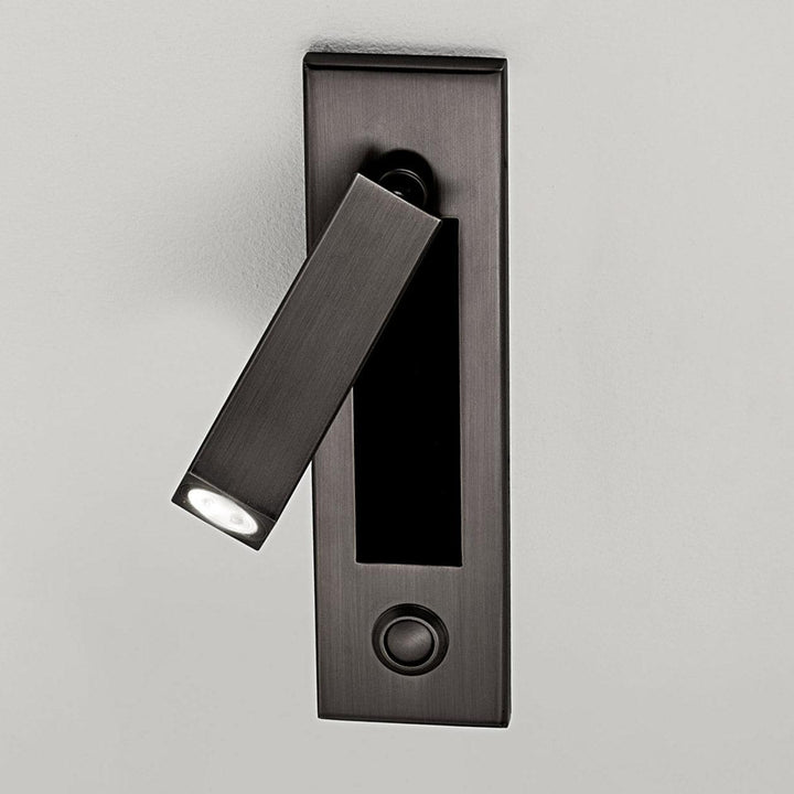 Energy-saving adjustable LED wall sconce, dimmable for cozy bedside reading.