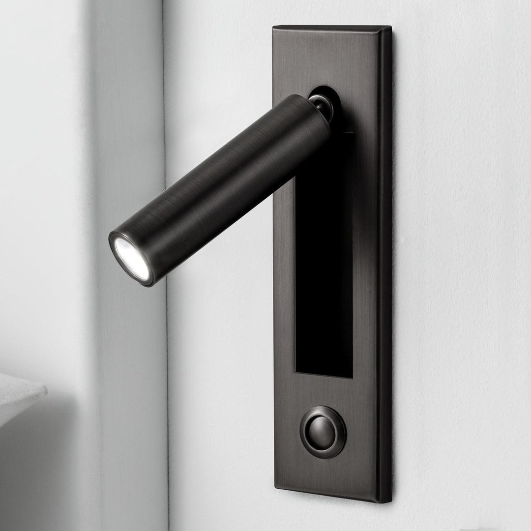 Modern LED bedroom wall light, adjustable for reading, adding sleek home lighting.