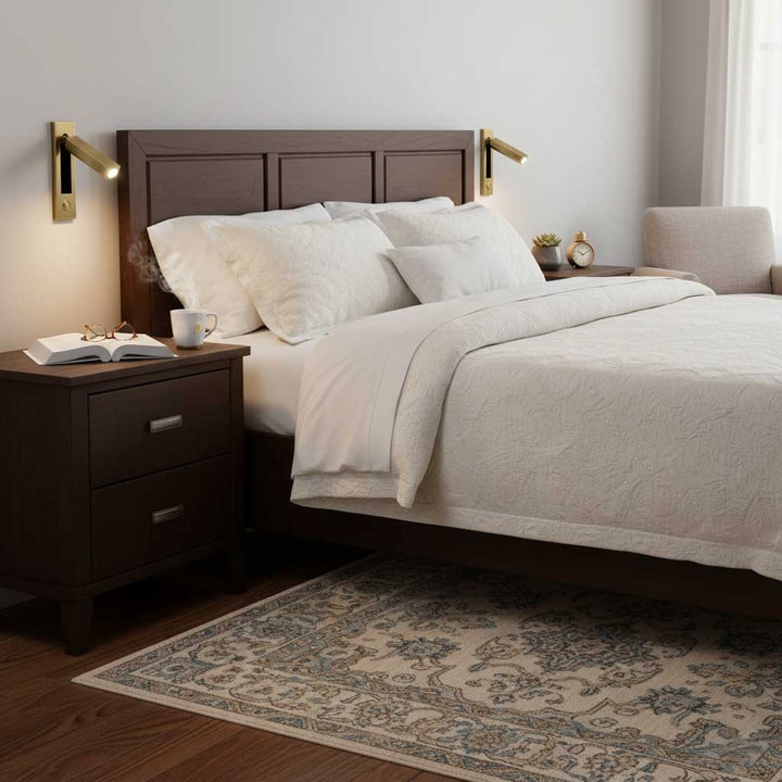 Contemporary adjustable LED reading light, wall-mounted for space-saving home lighting.