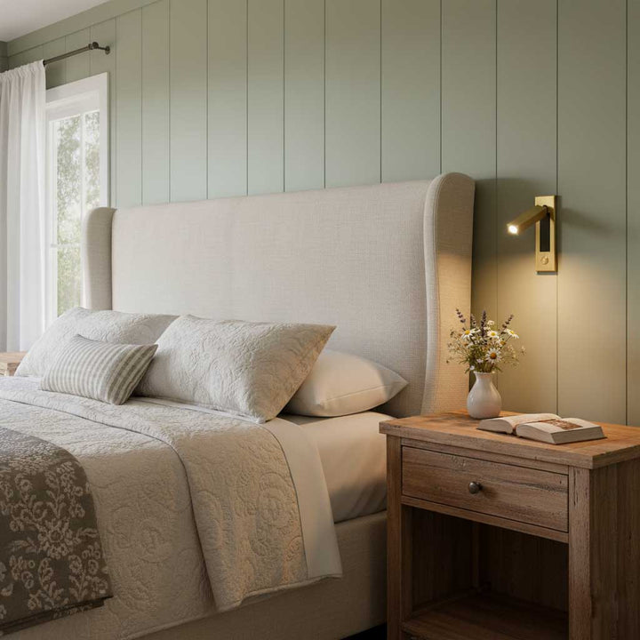 White modern LED wall sconce, adjustable for bedside reading & elegant bedroom decor.