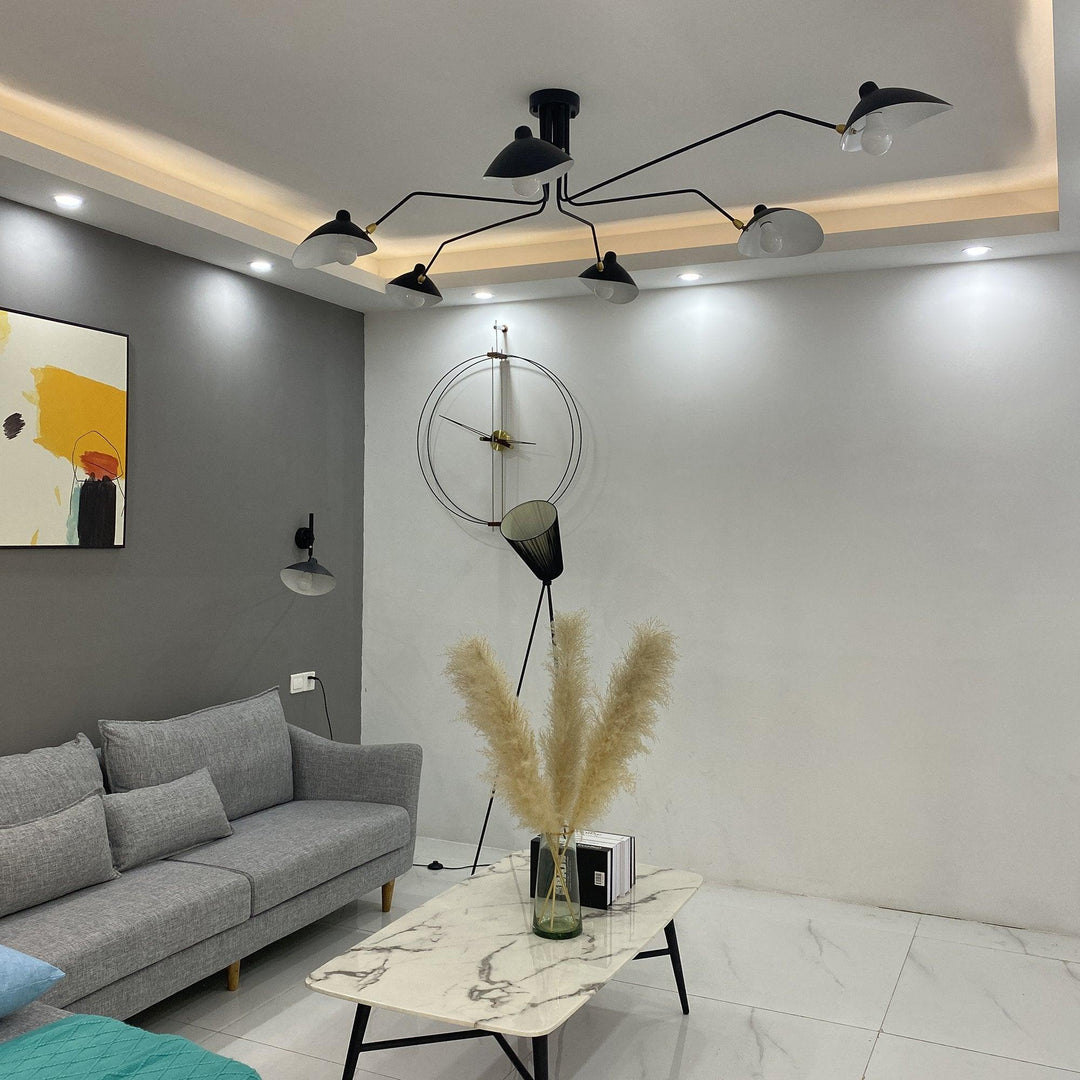 Modern adjustable multi-arm lamp, contemporary metal design for dining room lighting.