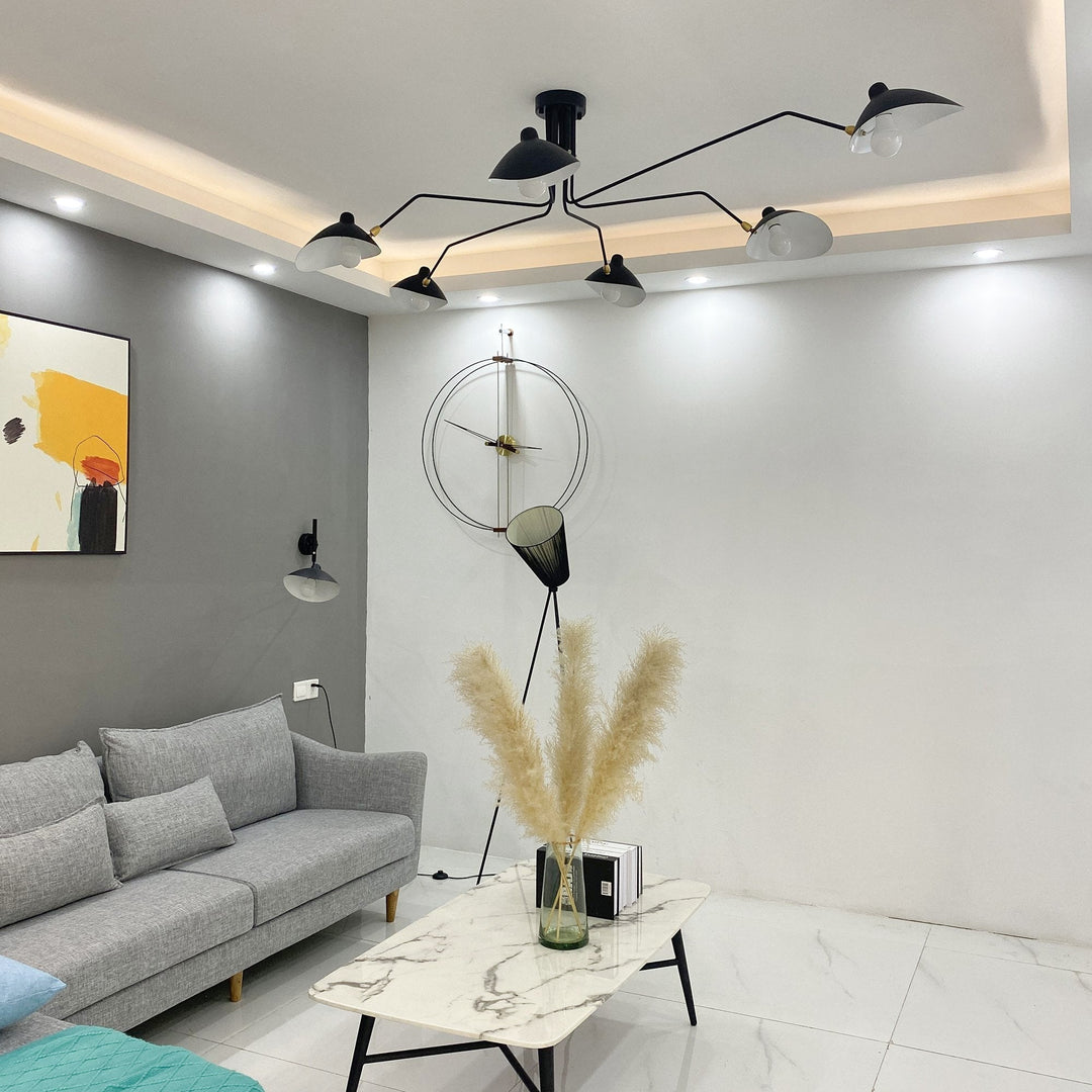 Modern multi-arm adjustable ceiling light, a contemporary metal statement for dining.