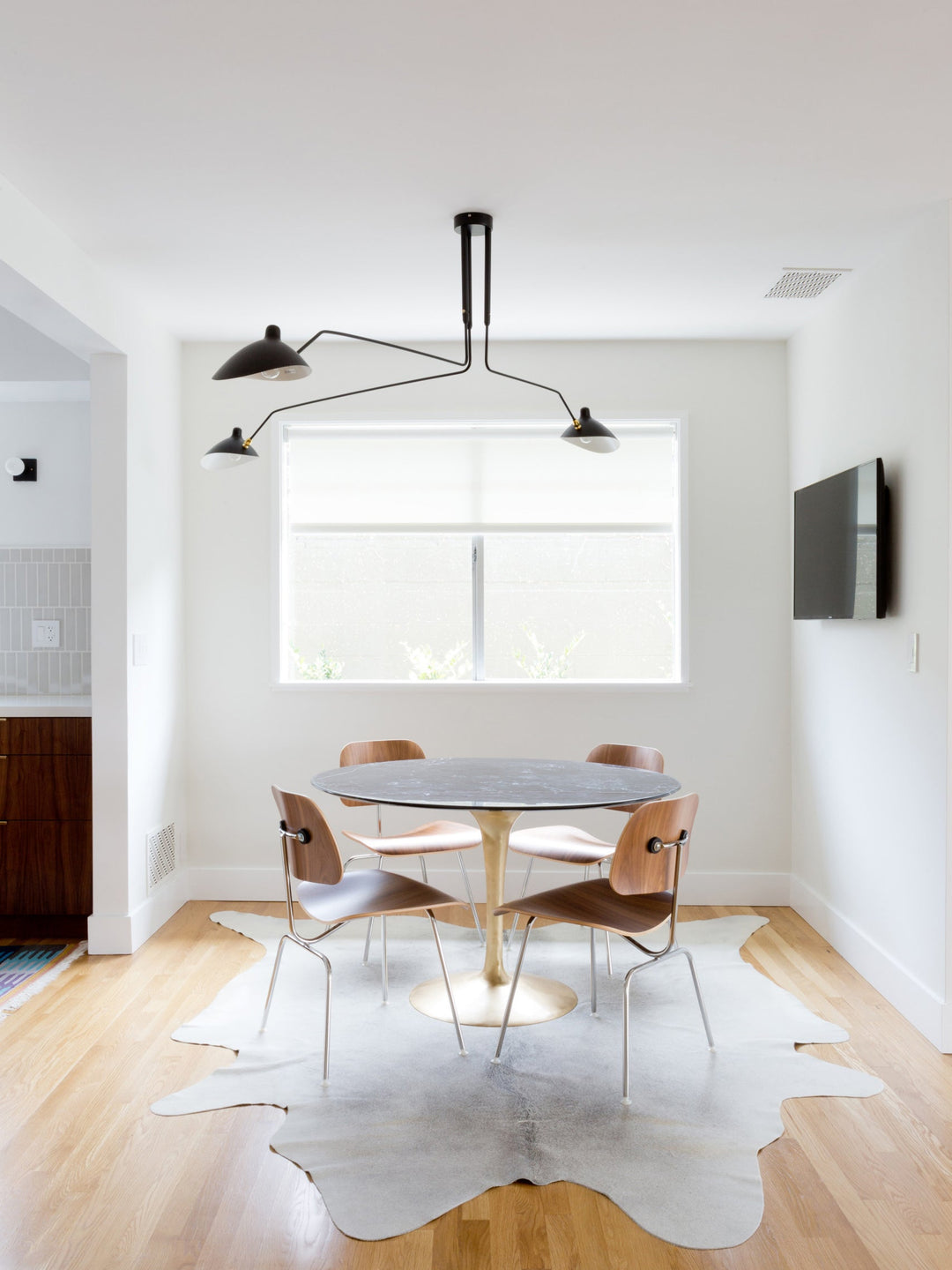 Modern multi-arm adjustable ceiling lamp, metal fixture for contemporary lighting.