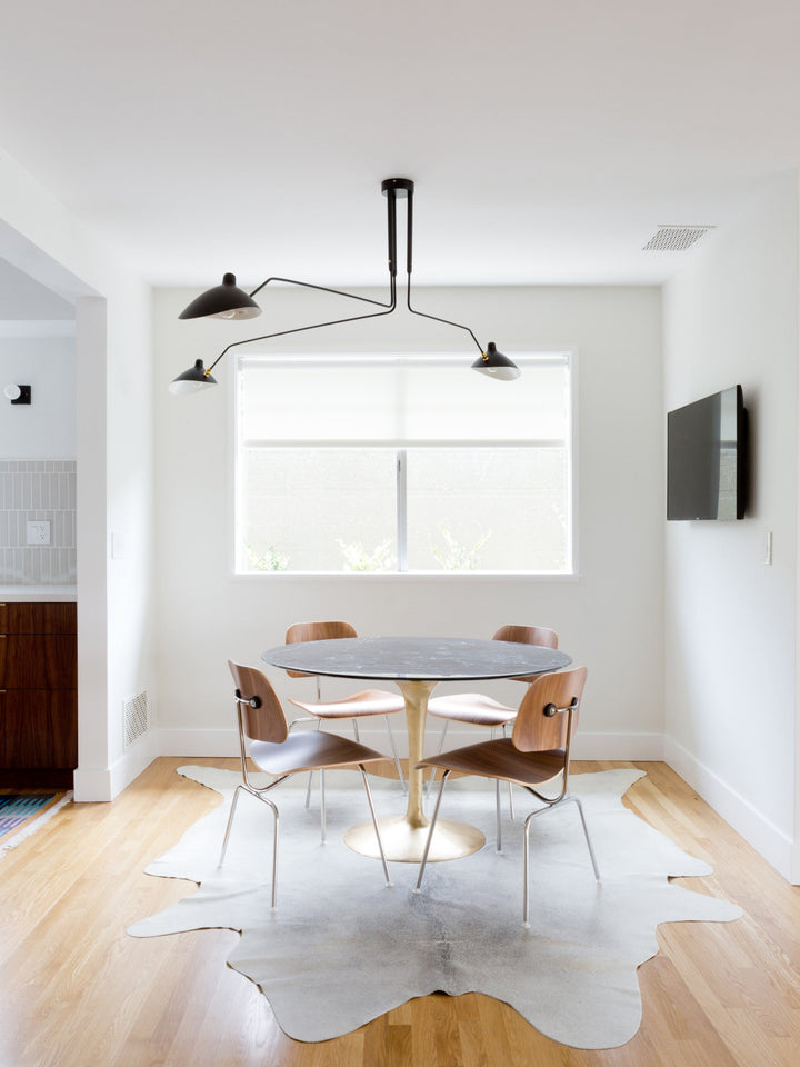 Modern multi-arm adjustable ceiling lamp, metal fixture for contemporary lighting.