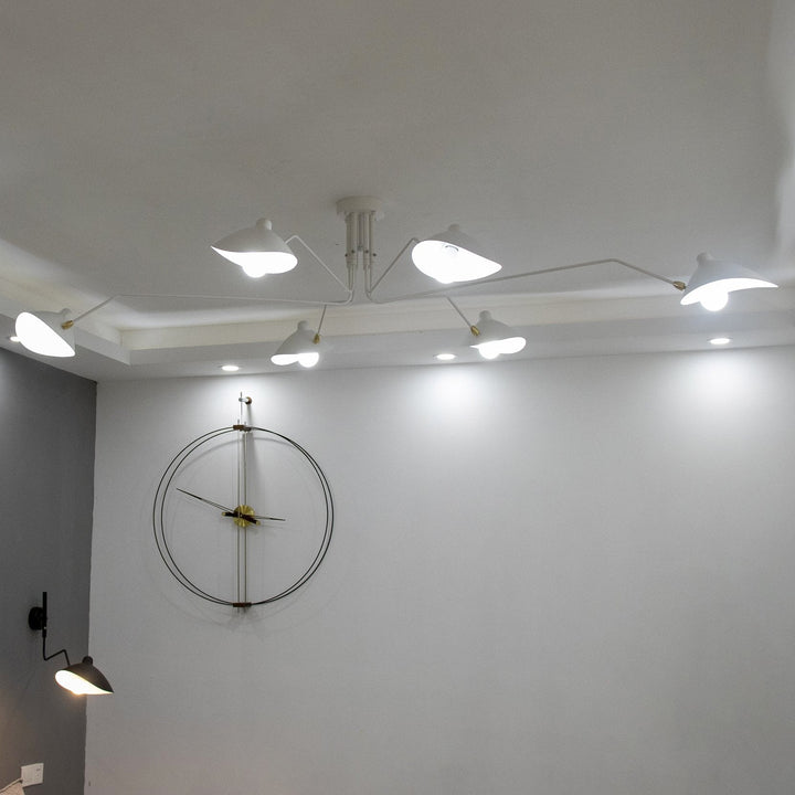 Modern multi-arm adjustable ceiling light, contemporary metal design for living room.