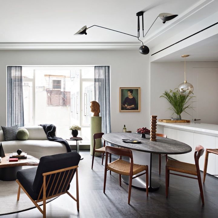 Modern adjustable multi-arm ceiling light, contemporary metal fixture for home ambiance.