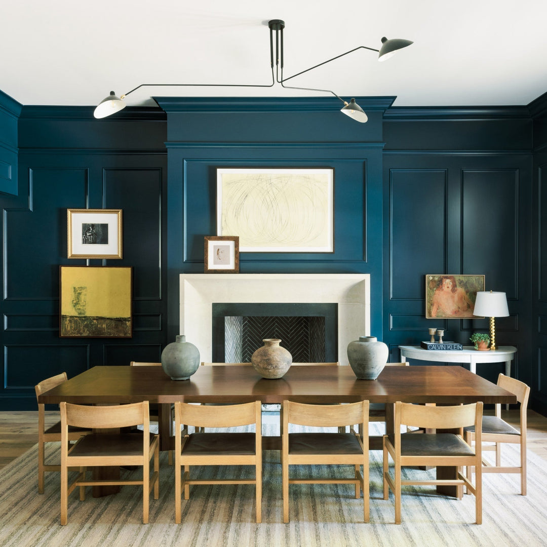 Stylish adjustable multi-arm ceiling light, sleek metal for modern living rooms.