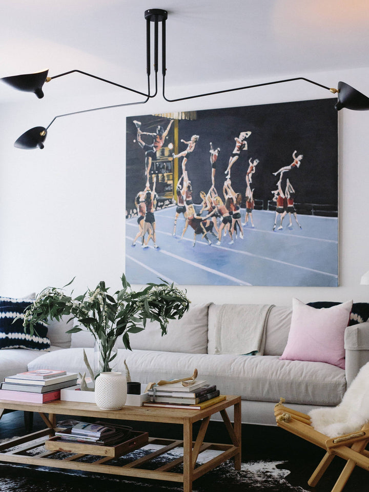 Minimalist adjustable multi-arm ceiling lamp, metal fixture for contemporary entryways.