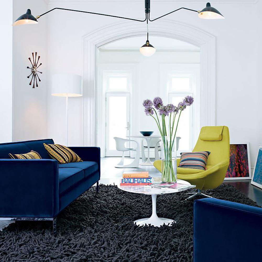 Modern adjustable multi-arm ceiling lamp, minimalist metal design for home offices.