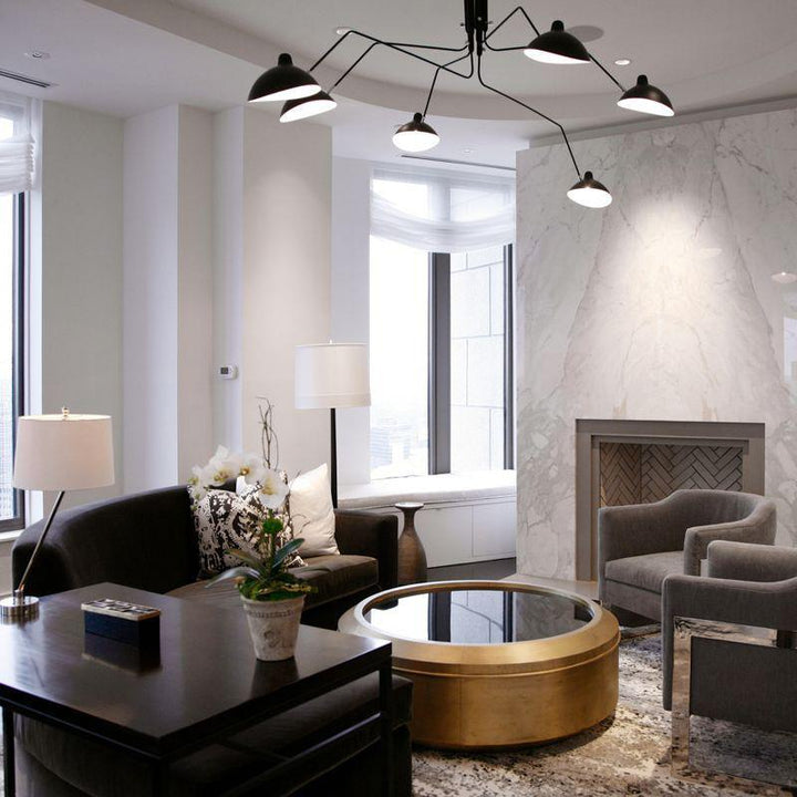 Elegant multi-arm ceiling light, adjustable metal fixture for contemporary entryways.