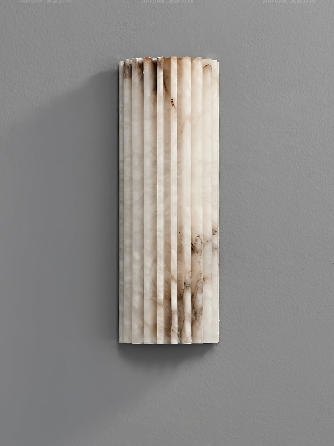 Minimalist alabaster LED wall lamp, modern aesthetic, casting soft, ambient light.