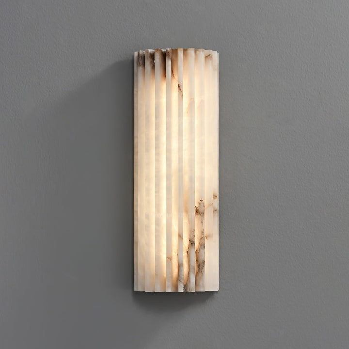 Designer alabaster LED wall sconce, showcasing natural beauty and modern function.