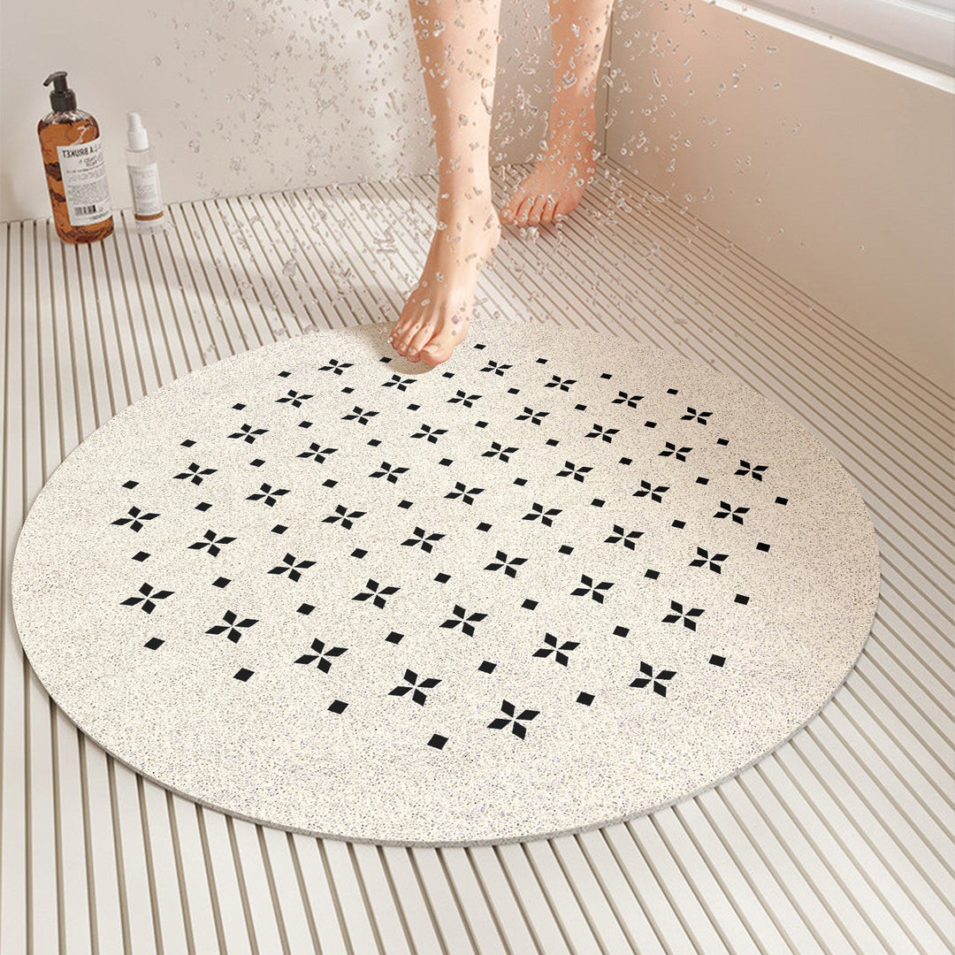 Safe, stylish square anti-slip shower mat with quick-dry feature. Modern geometric design for bathroom floor safety.