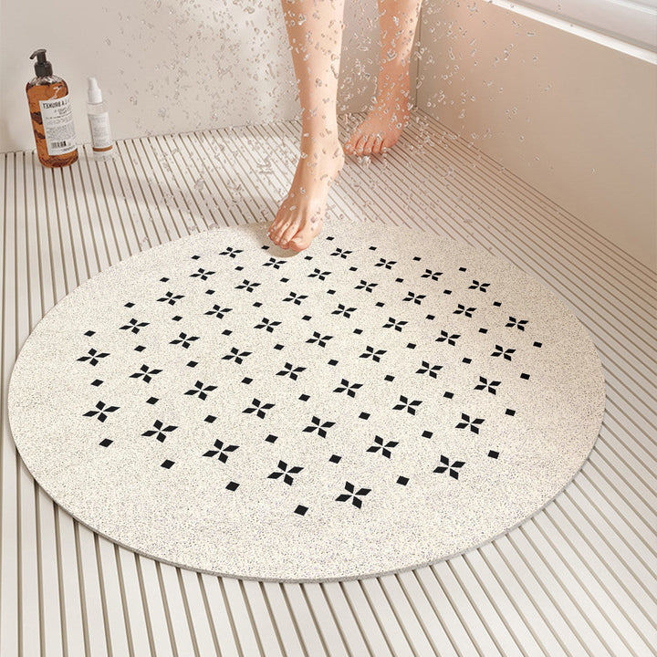 Safe, stylish square anti-slip shower mat with quick-dry feature. Modern geometric design for bathroom floor safety.