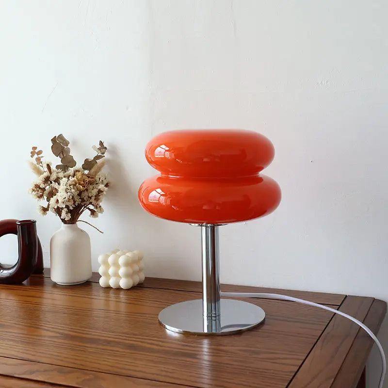 Modern Bauhaus style LED table lamp, dimmable for ambient light on desks or for reading.