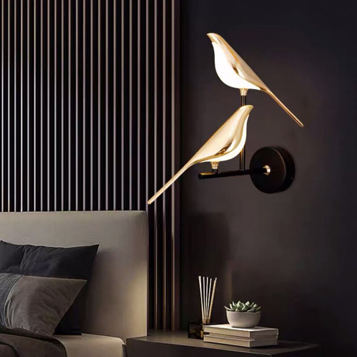 Elegant bird-shaped wall lamp with flexible magnetic mount, ideal for modern home accent & lighting.