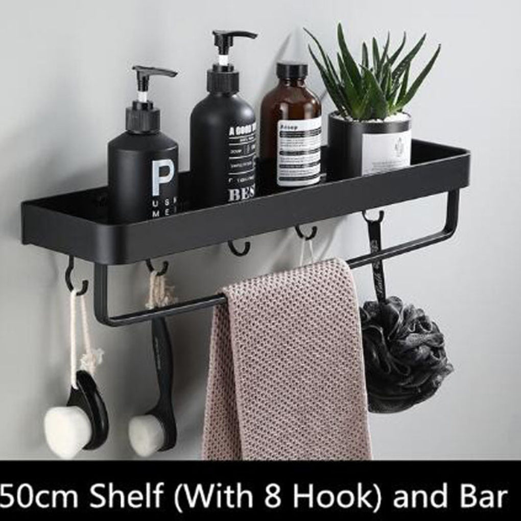 Modern black aluminum floating wall shelf for bathroom storage, organizing towels & toiletries. Space-saving design.