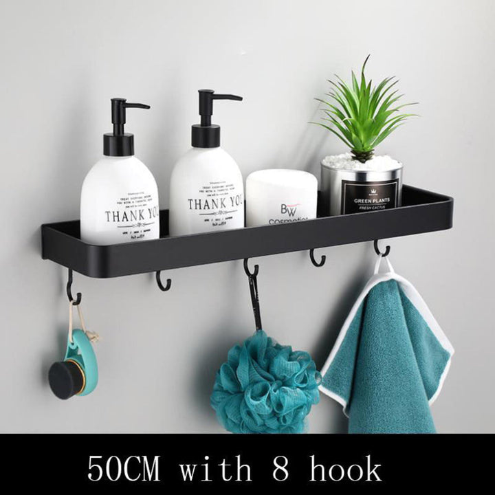 Sleek black aluminum floating bathroom shelf with hooks. Modern wall-mounted organizer for shower essentials & towels.