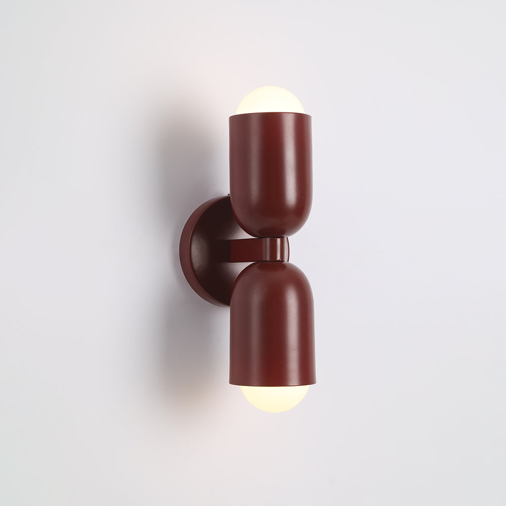 Chic blue cylindrical LED wall light, adds a pop of color to any room's decor.