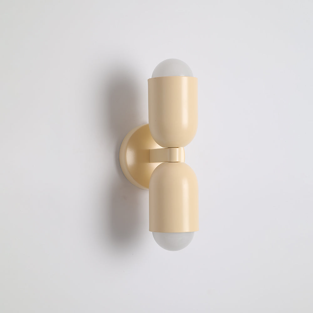Yellow cylinder LED accent lamp, bright and contemporary indoor fixture.