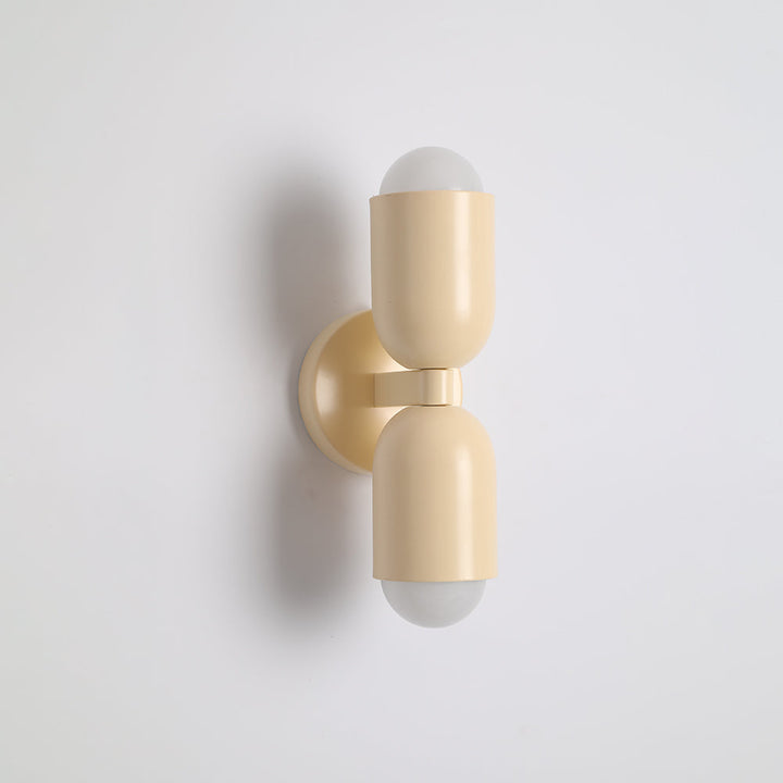 Yellow cylinder LED accent lamp, bright and contemporary indoor fixture.