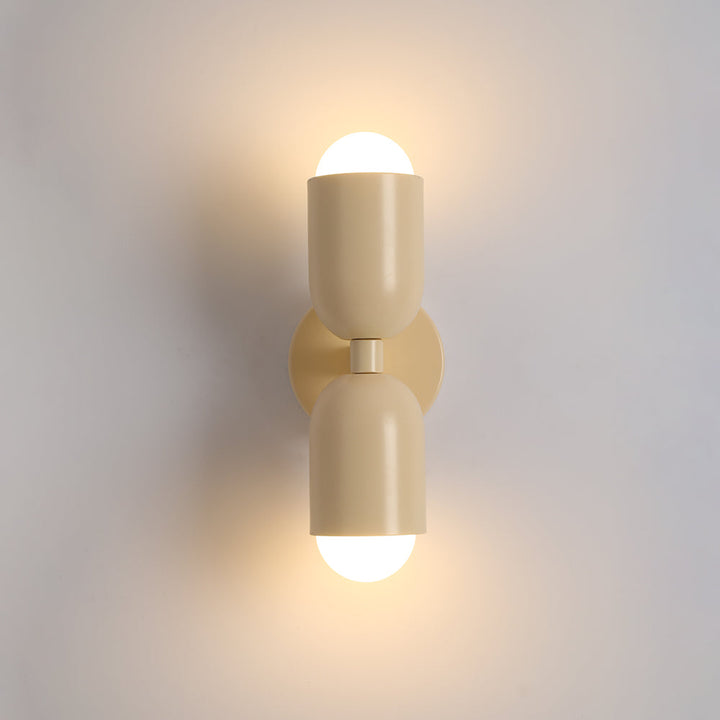 Purple sleek LED wall light, cylinder shape, unique modern home decor.