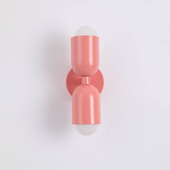 White cylindrical LED wall light, accent for modern living rooms and bedrooms.