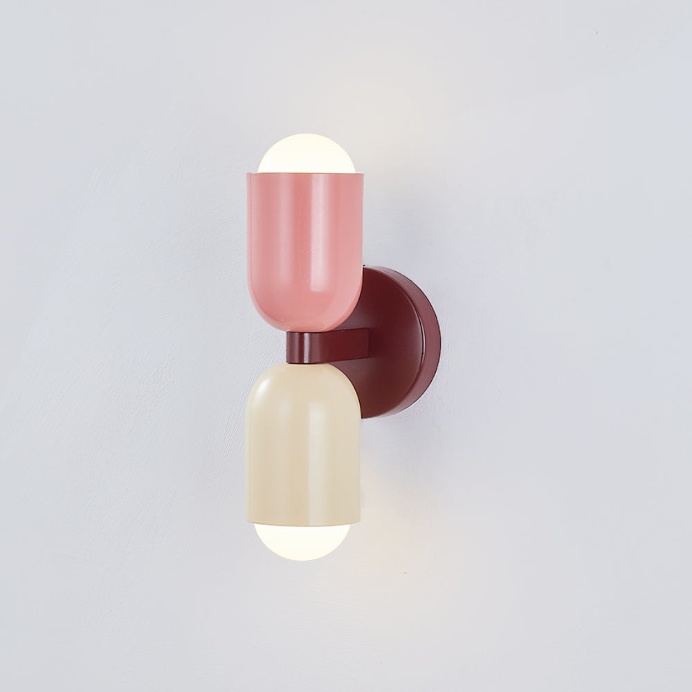 Brass finish modern LED cylinder light, elegant and contemporary wall mounted.