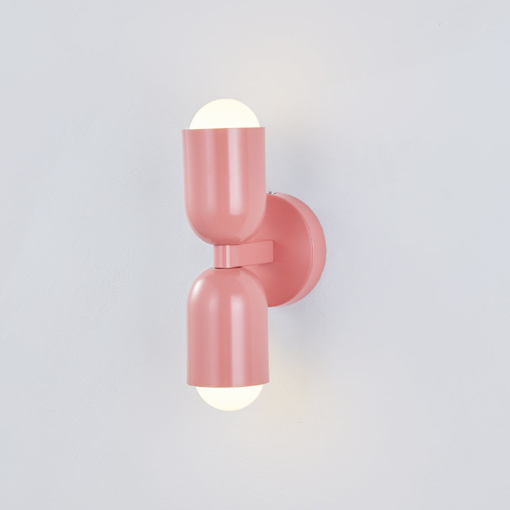 Textured black modern LED wall lamp, cylindrical, durable metal build.