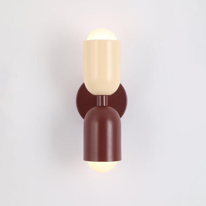Horizontal modern LED cylinder light, sleek accent for art or mirrors.
