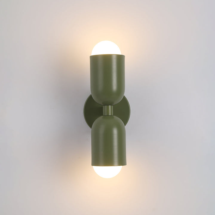 Durable metal cylinder LED lamp, modern indoor wall fixture with long lifespan.