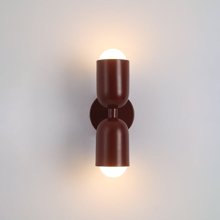Ambient light LED cylinder wall fixture, contemporary style for bedrooms.