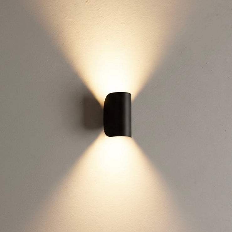 Modern black LED up down wall sconce light fixture, perfect for contemporary indoor or outdoor lighting.