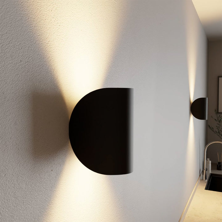Energy-efficient LED wall sconce, offering distinctive up down illumination for any space.