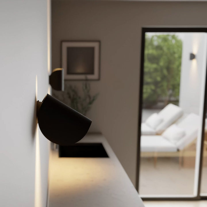 Adjustable modern LED wall sconce with up down light, ideal for personalized home ambiance.