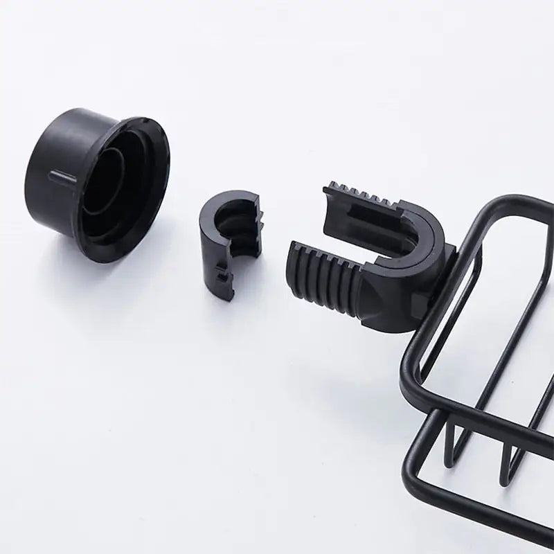 Sleek wall-mounted black metal shower shelf, a durable bathroom organizer with a modern finish for shower storage.