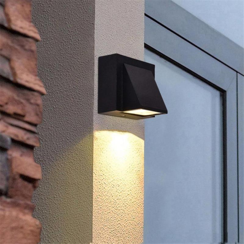Sleek grey modern exterior wall lamp, perfect for garden pathways and home decor.