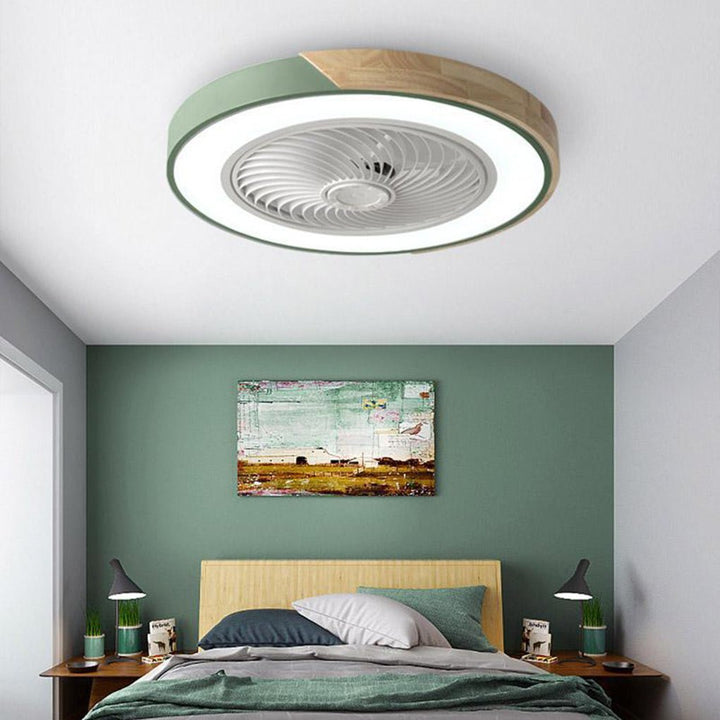 Sleek modern bladeless ceiling fan, flush mount with integrated LED light & remote for contemporary interiors.