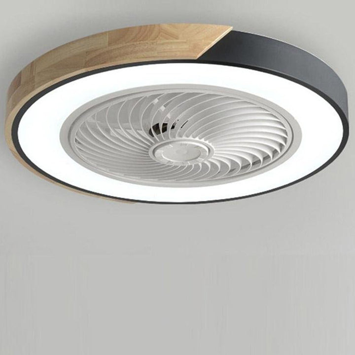 Space-saving modern bladeless ceiling fan with bright LED light and remote, flush mount design for any room.