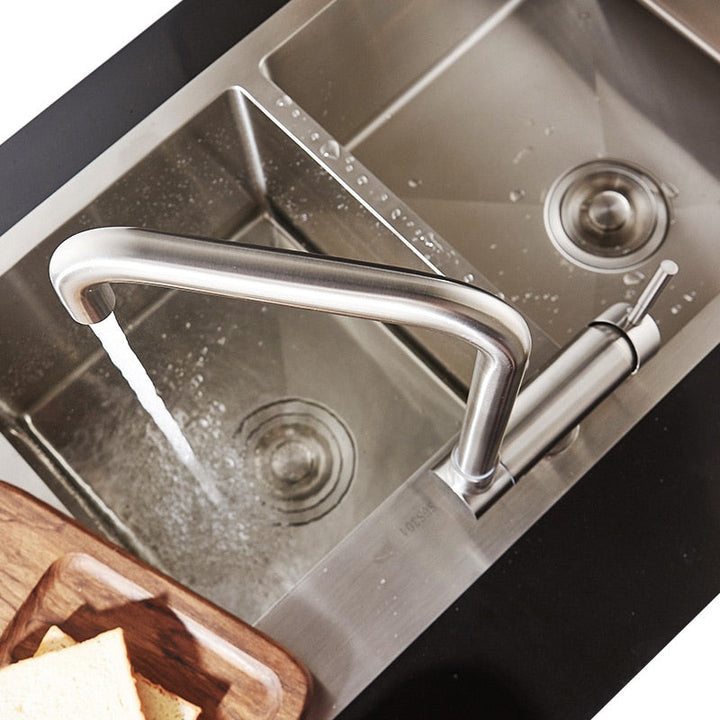 Elegant brushed nickel modern faucet with 360° swivel and easy-to-use single handle design.