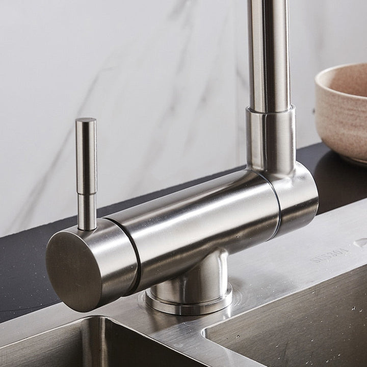 Stylish black single handle kitchen faucet, 360° swivel, enhancing any modern kitchen's aesthetic.