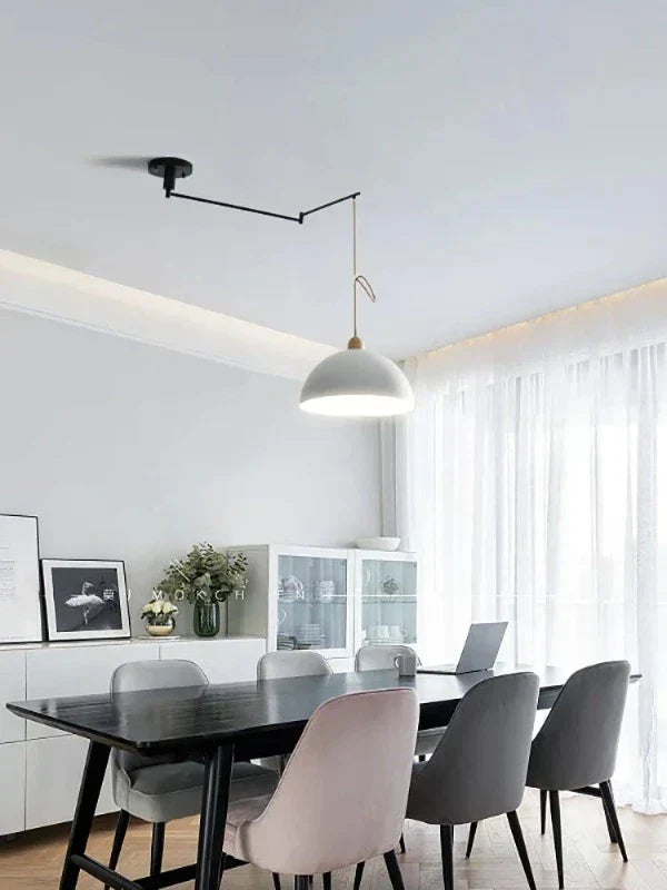 Sleek modern ceiling light, adjustable arms create flexible ambient lighting perfect for dining rooms.
