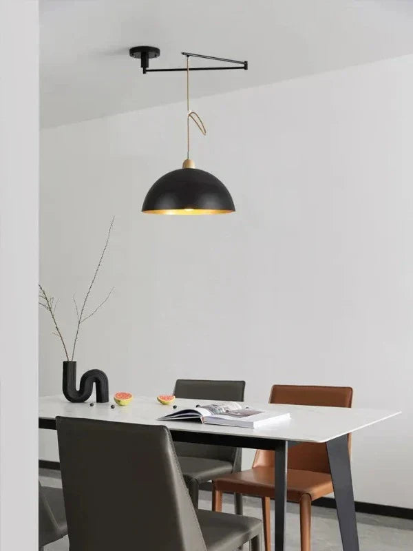 Contemporary ceiling light with adjustable arms, providing versatile warm to neutral light for any modern home.