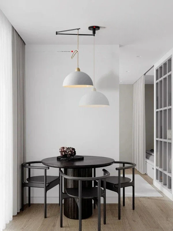 Contemporary adjustable ceiling light, offering custom illumination for stylish living and dining rooms.