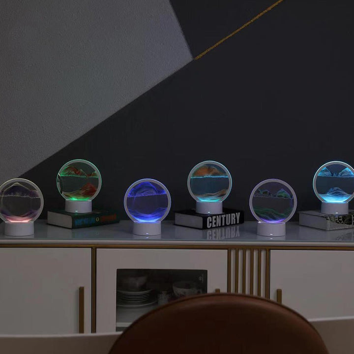 Circular LED sand art lamp displaying mesmerizing flowing sand patterns. Modern decorative table lamp for relaxation.
