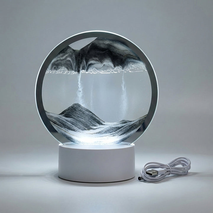 LED circular sand art lamp, a modern decorative piece. Offers soothing ambient lighting & mesmerizing flowing sand.